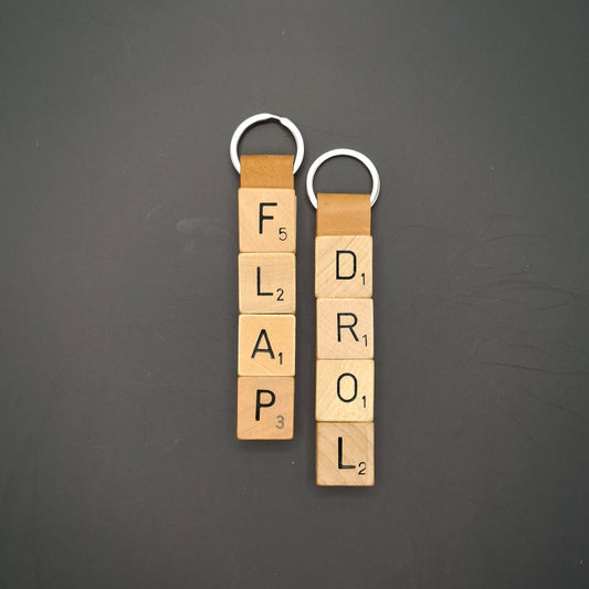 Sleutelhanger met quote: "Flap Drol"